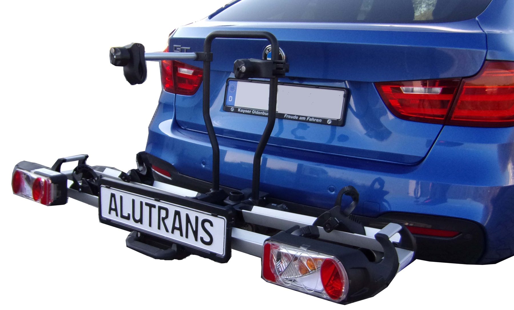 ALUTRANS Fahrradträger auf der Anhängerkupplung eines blauen PKW